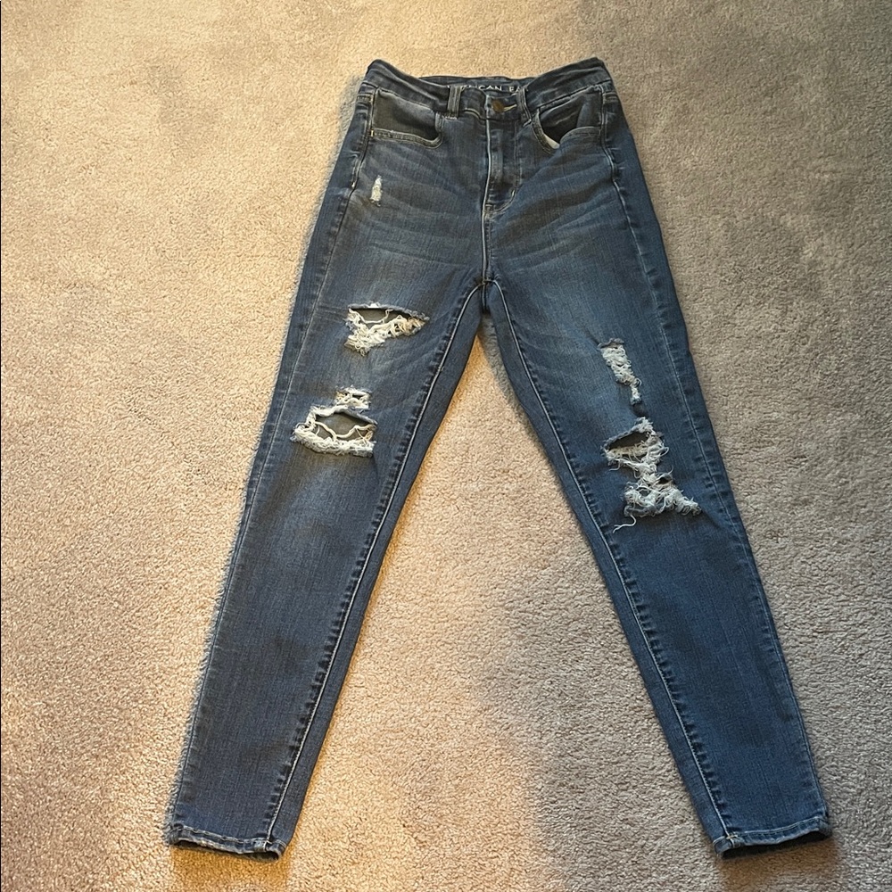 American Eagle Next level Stretch Curvy Super Hi-Rise Distressed Jegging Jeans